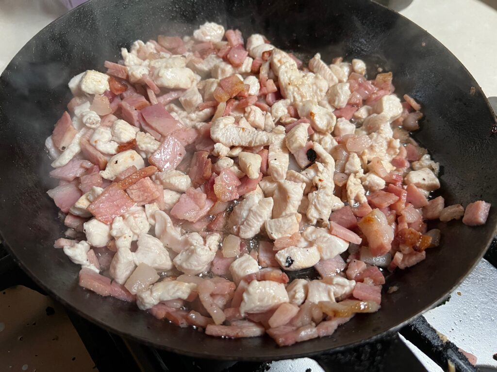 Bacon and chicken cooking