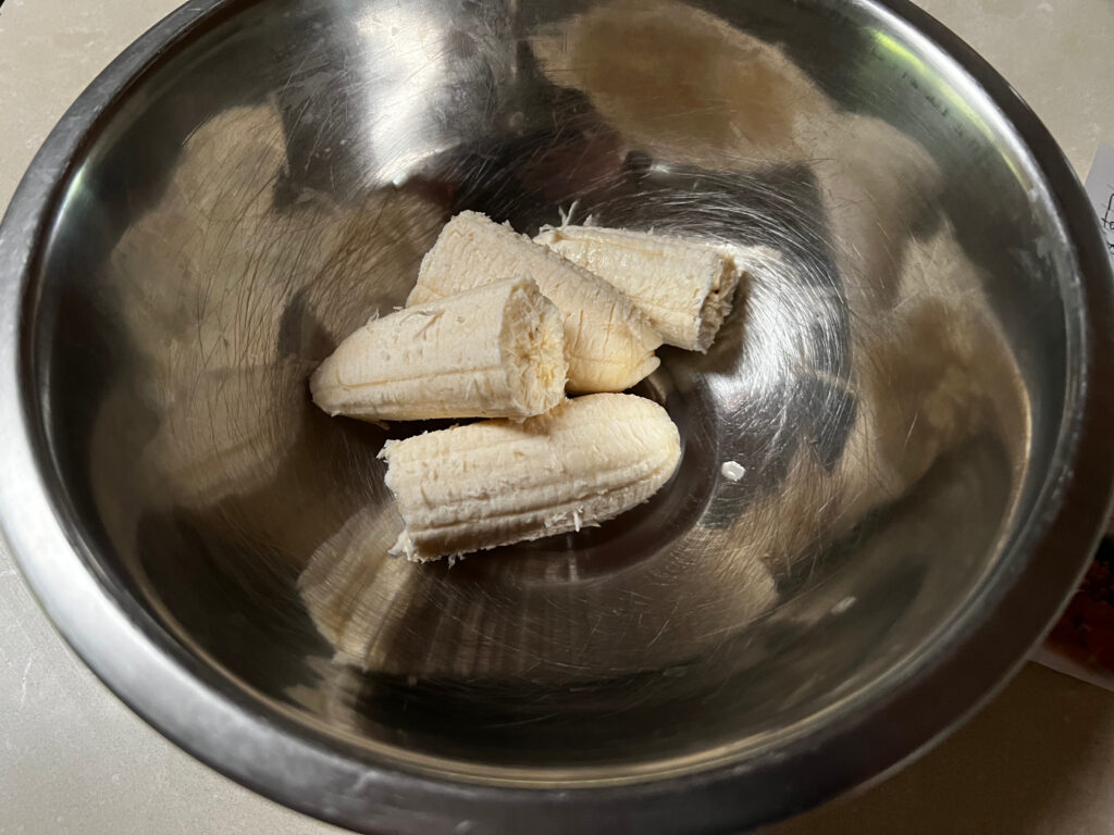 Banana in a stainless steel bowl