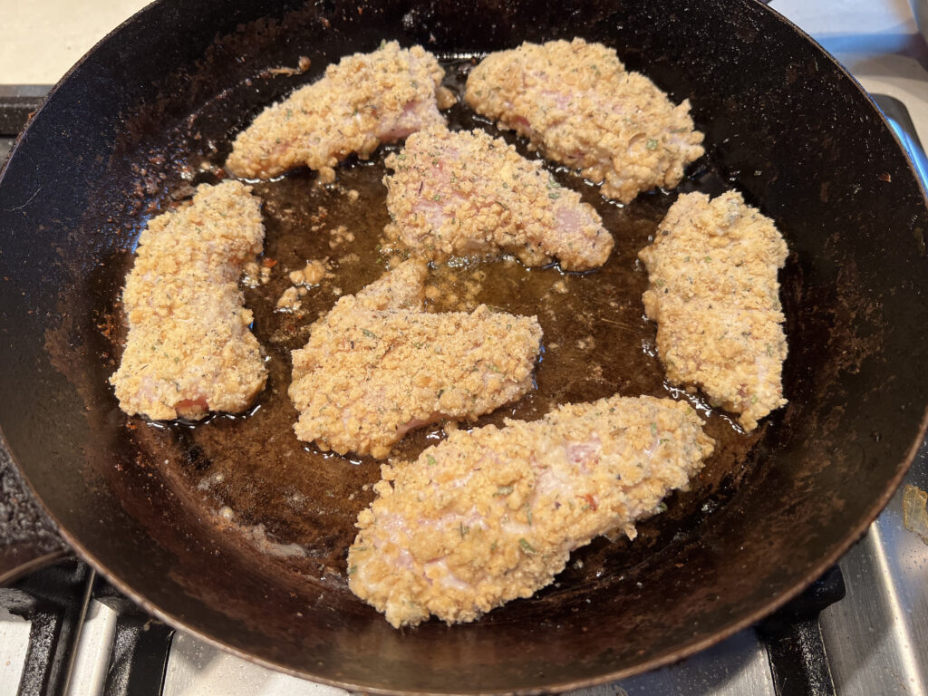 Crumbed Chicken in frying pan